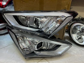 چراغ جلو سانتافه ۲۰۱۵ زنون کد فنی 921012WXXX استوک - کارکرده - دست دوم - تمیز در حد نو اورجینال جنیون گردشی